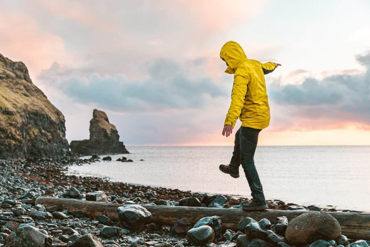 Drop by 90%! Is there hope for Ocado's share price? 11 A man hangs by a thread from a log on the seashore in Scotland