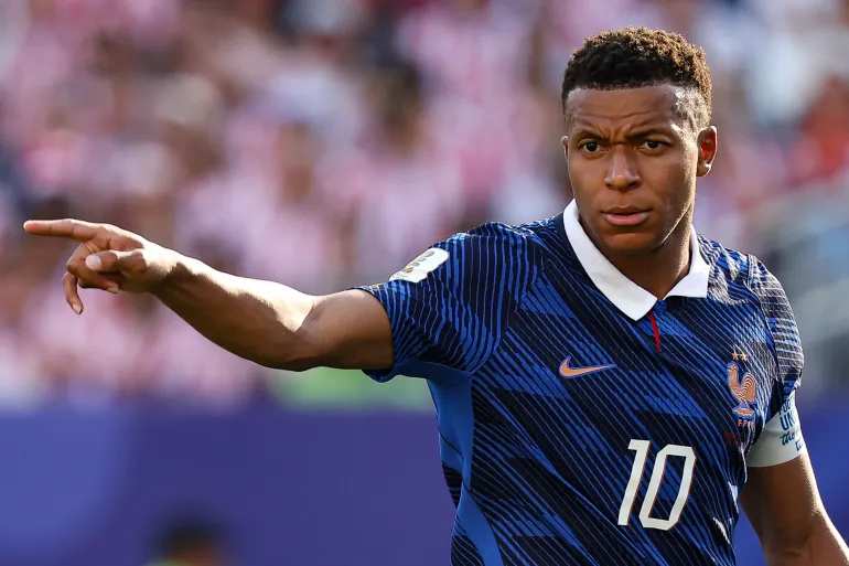 Kylian Mbappe in action against Paraguay in the 1/8 finals match