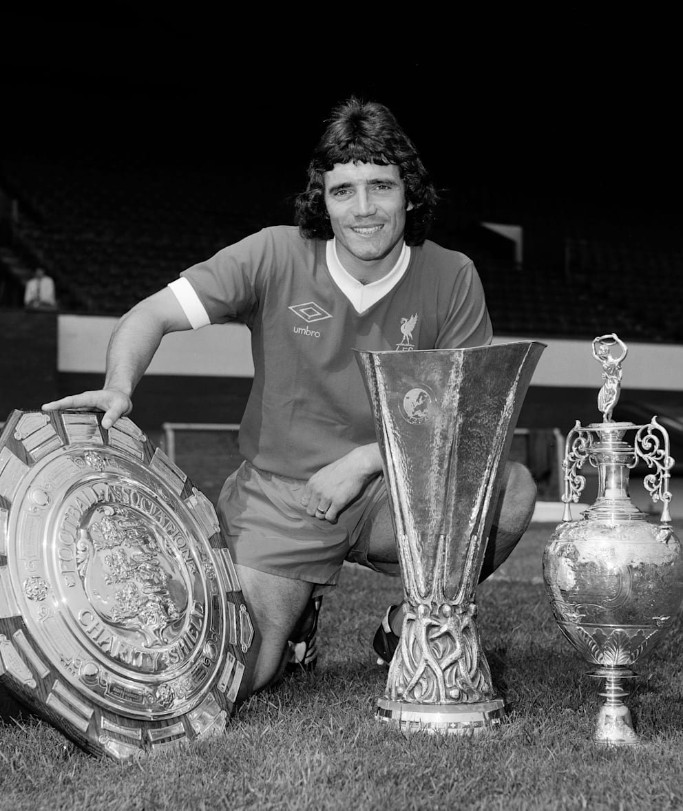 July 1976: Keegan with the Charity Shield trophy and the UEFA Cup and League Championship trophy.