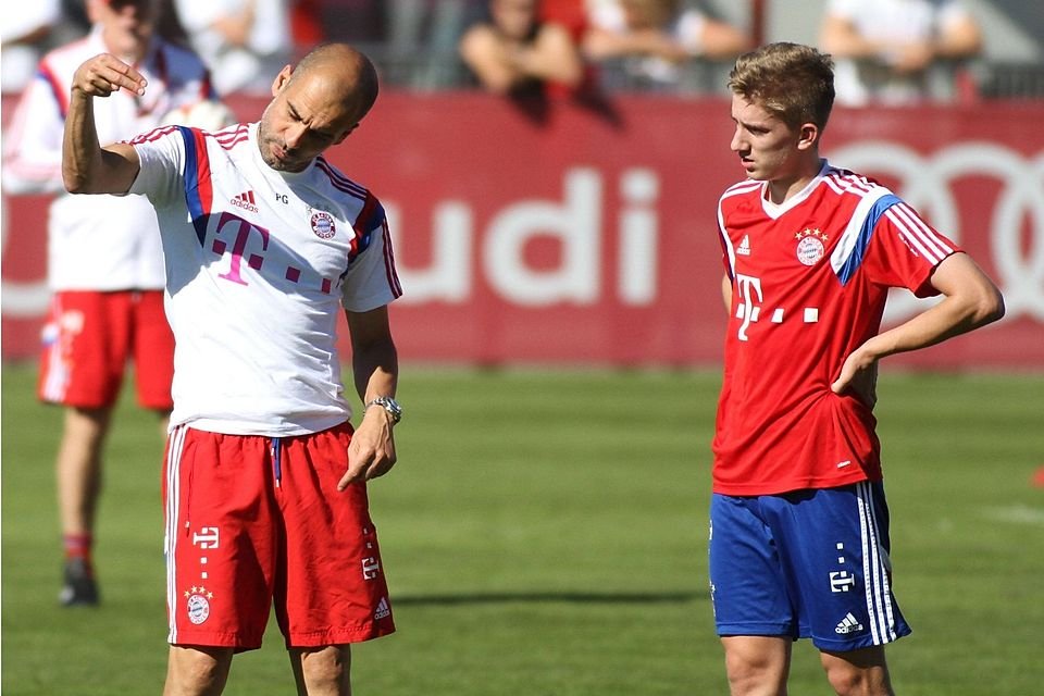 World-class coach Pep Guardiola (left) and Sinan Kurt.