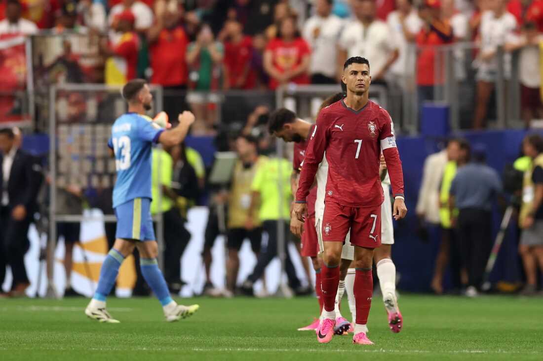 Portugal #7 Cristiano Ronaldo shows despondency after the team's 0-1 loss in the 2026 FIFA World Cup Round of 16 match between Portugal and Spain at Dallas Stadium on July 6, 2026 in Arlington, Texas.