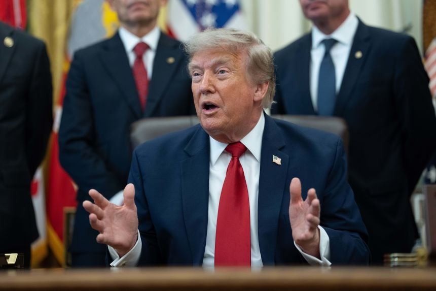 How aides and allies persuaded Trump to waive tolls in the Strait of Hormuz 16 US President Donald Trump signs an executive order in the Oval Office of the White House in Washington, DC, Monday, July 13, 2026.