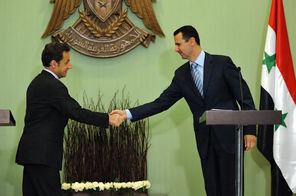 How historic is Emmanuel Macron's visit to Syria? 11 Nicolas Sarkozy and Bashar al-Assad at the presidential palace in Damascus, Syria, January 6, 2009.