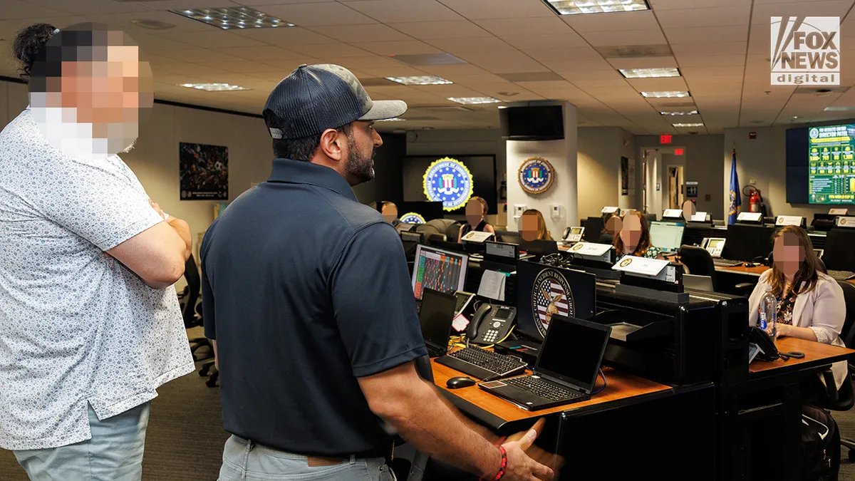 Kash Patel speaks to an audience at FBI headquarters.