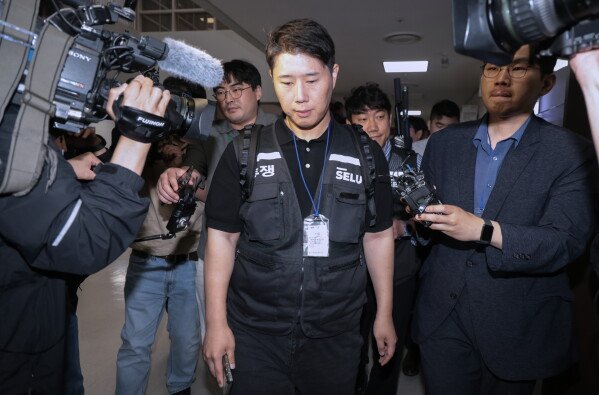 Korean tech giants plan new chip center as demand for AI rises 11 Choi Seung-ho, Samsung Electronics union leader, leaves after attending mediation talks with government leadership at the National Labor Relations Commission office in Sejong, South Korea, Wednesday, May 20, 2026. (Yonhap via AP)