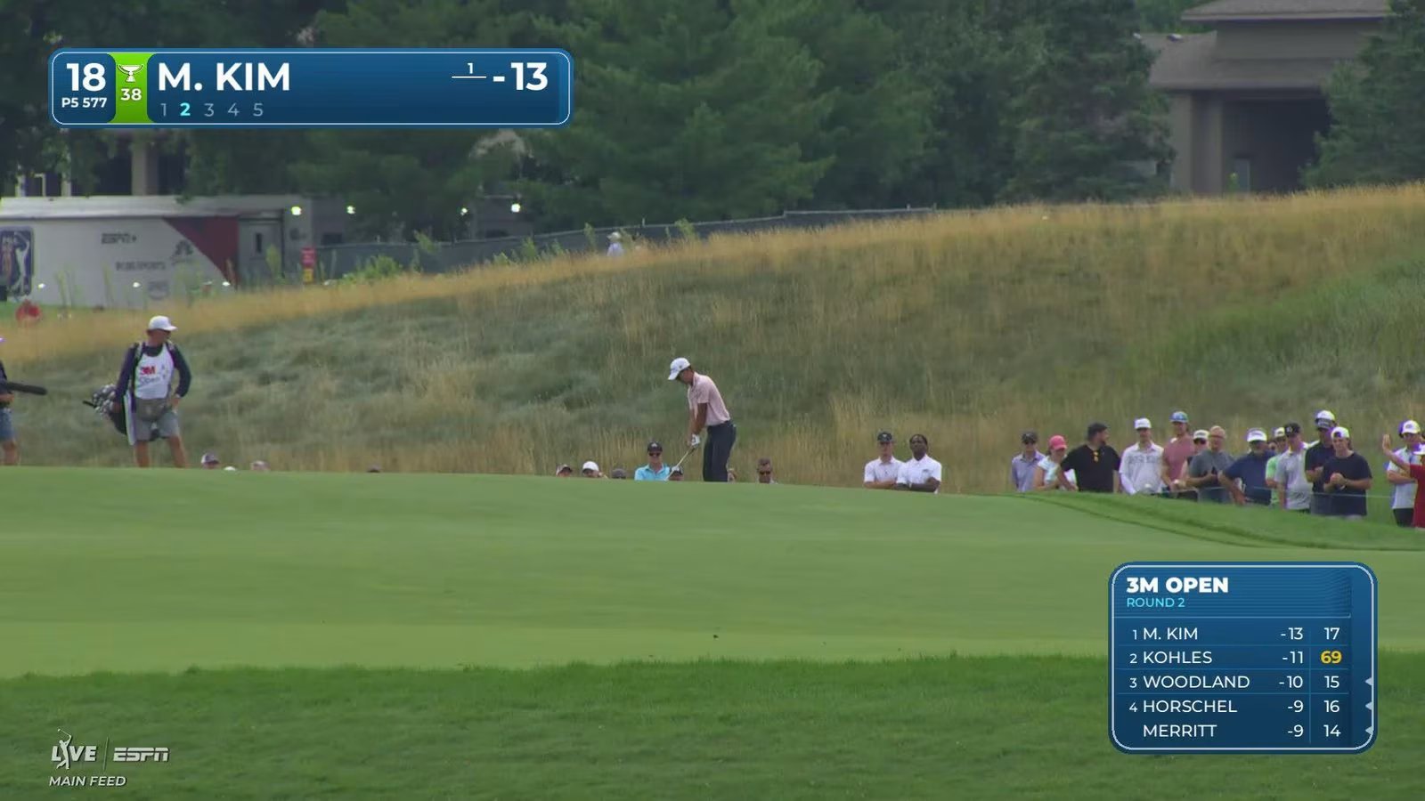 Michael Kim makes a 24-foot birdie putt on No. 18 at the 3M Open