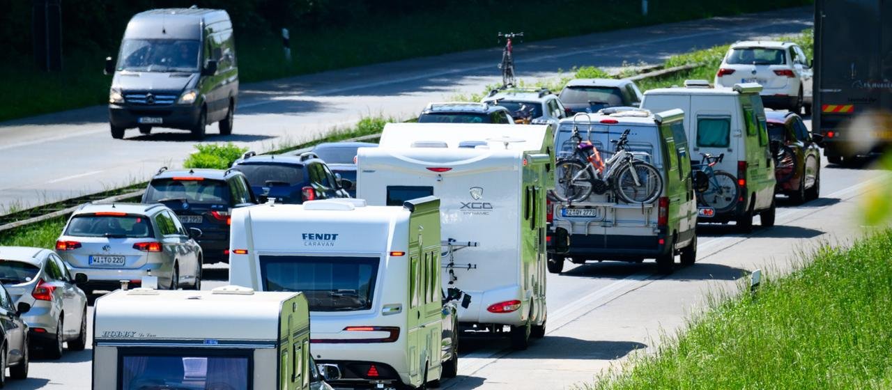 Various mobile homes and campers on the highway