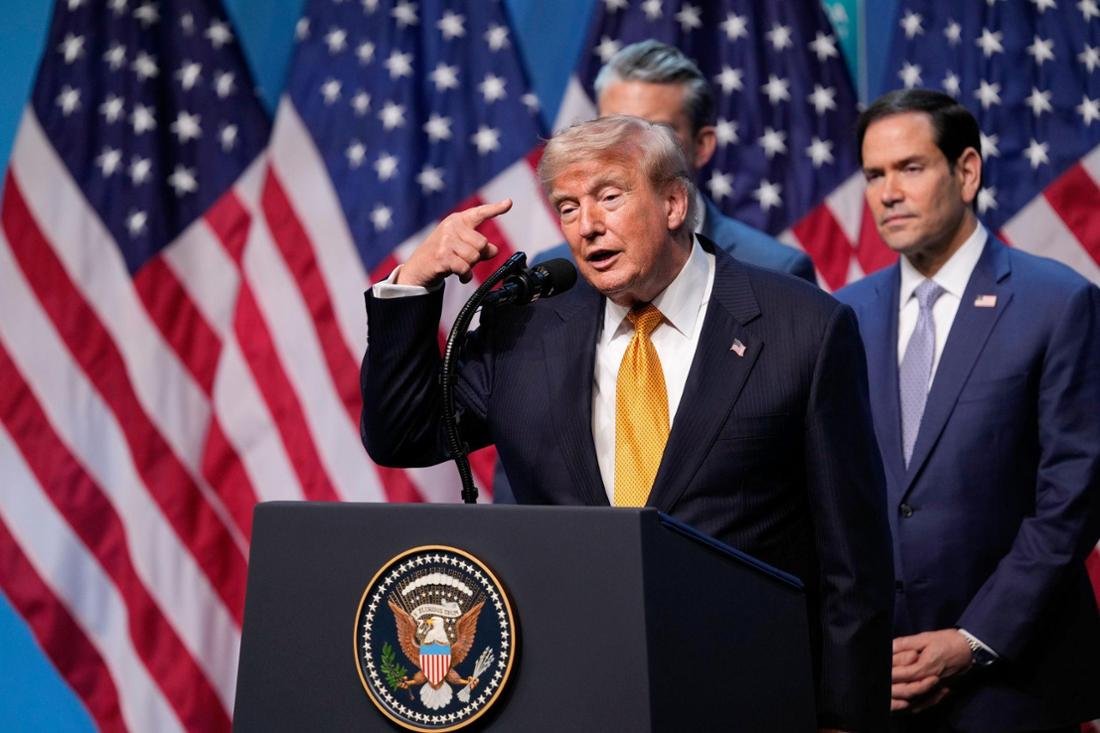 US President Donald Trump (left) speaks during a news conference flanked by US Defense Secretary Pete Hegseth and US Secretary of State Marco Rubio (right) at the NATO summit in Ankara.