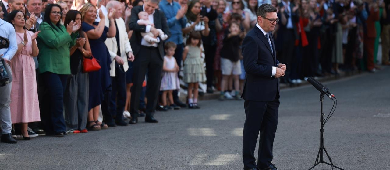 Andy Burnham stands in front of No. 10 Downing Street.