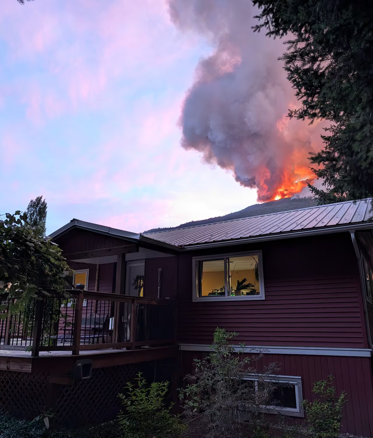 Fire behind the house.