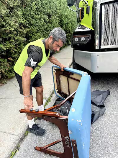 (PHOTOS) This trash collector collects the treasures you throw in the trash. 17 Steve Chartrand picks up any recyclable trash in his path, like this folding massage table.