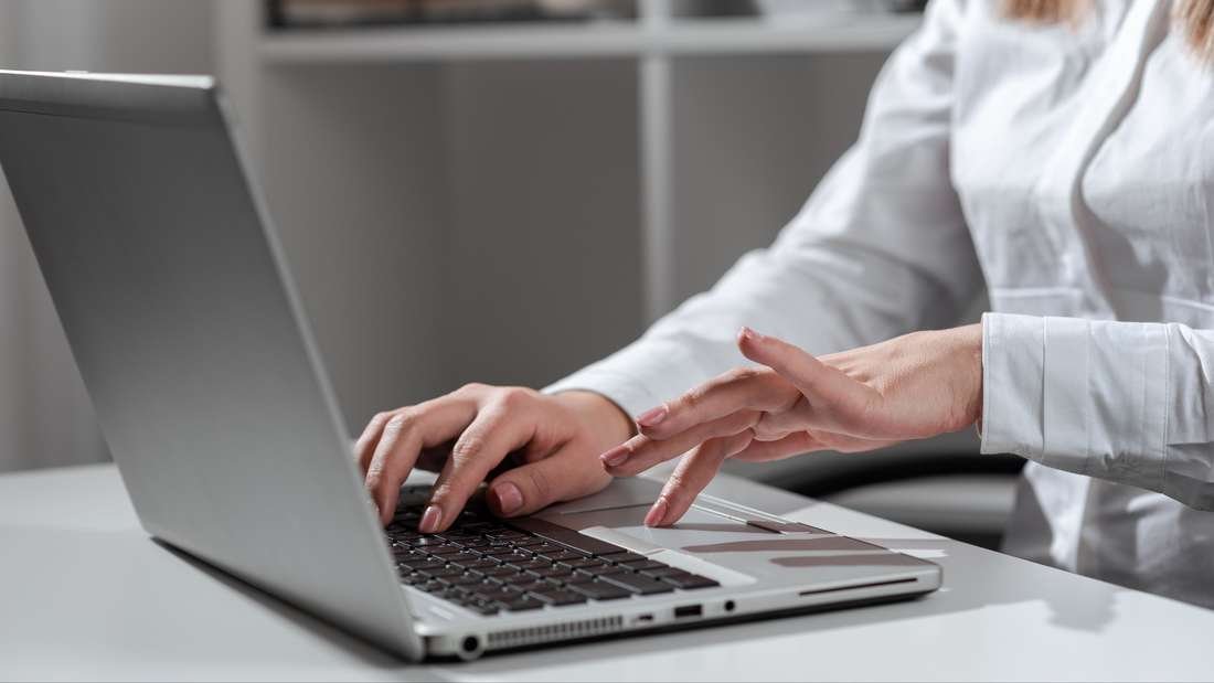 A woman reports illness by email. 