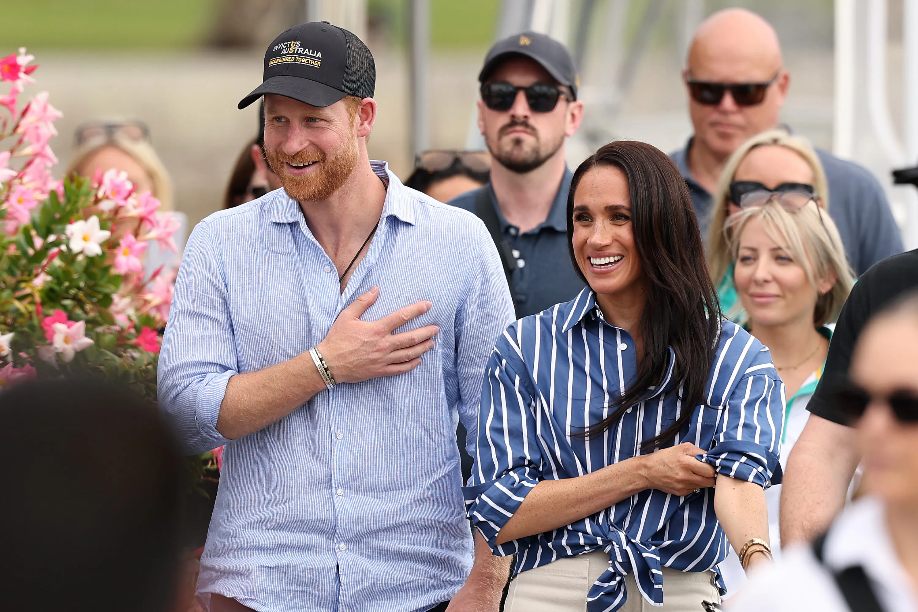 Prince Harry 'devastated and on the verge of tears' over security concerns during his stay in the UK 11 Image may include Prince Harry, Duke of Sussex, Meghan, Duchess of Sussex, baseball cap, cap, clothing, hat and an adult.