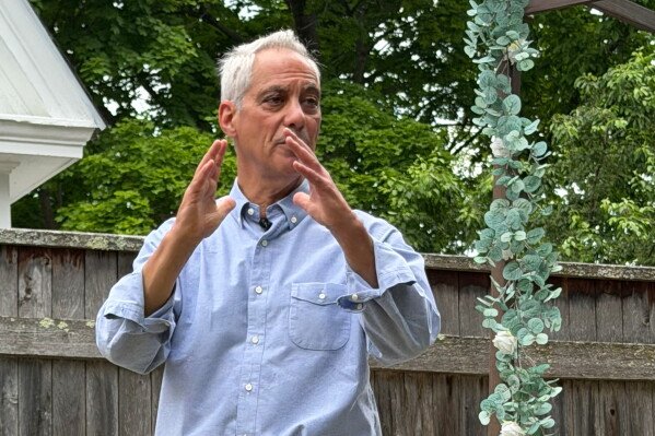 Rahm Emanuel performs at a house party in Concord, New Hampshire on Saturday, June 6, 2026. (AP Photo/Steven Sloan)