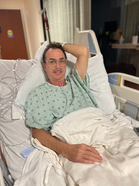 Rare transplant gives stage 4 lung cancer patients a second chance at life - Capitol Hill man is proof 14 Peterson in a hospital bed