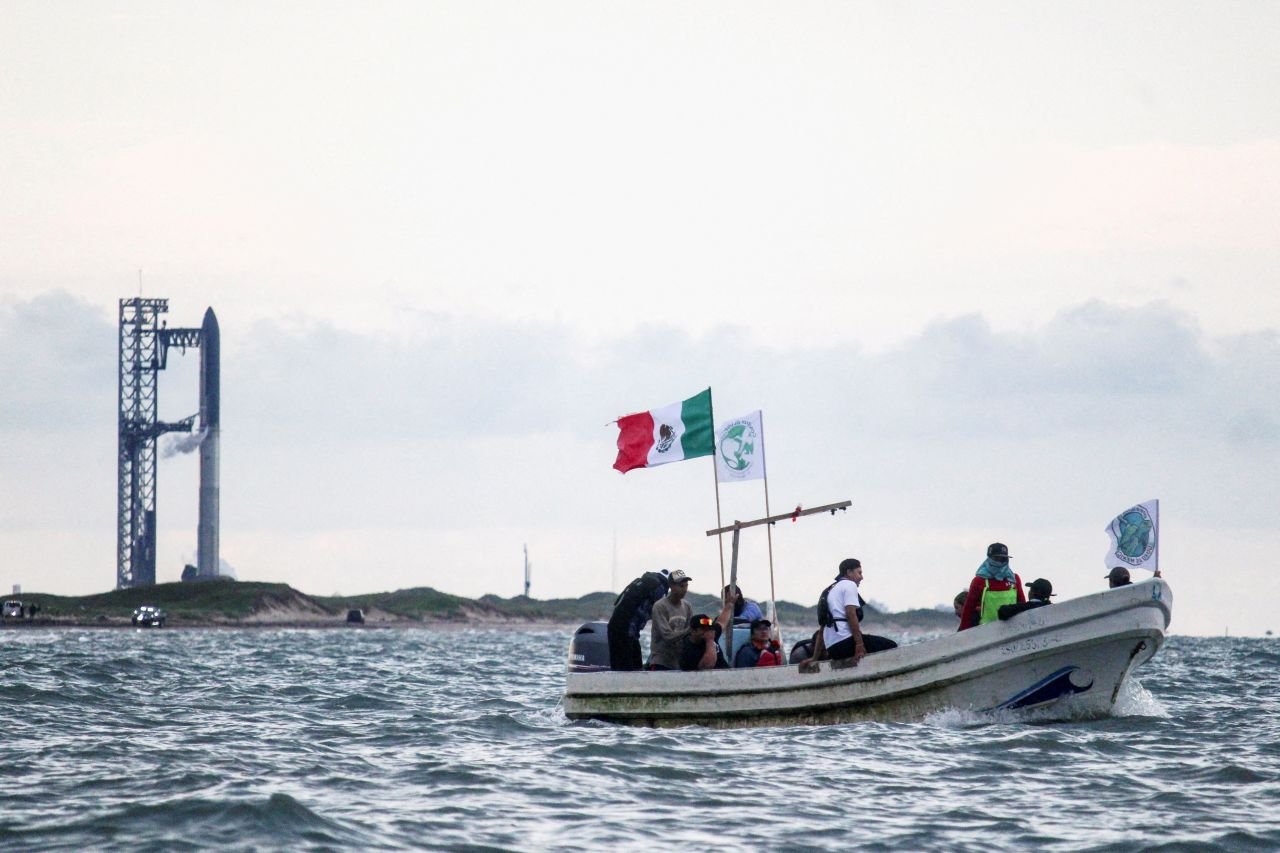 Mexican environmentalists protest aboard a boat near the SpaceX Starbase launch pad on the south Texas coast on August 24, 2025.
