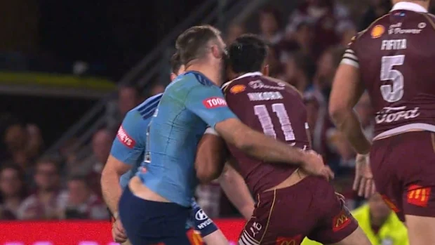 James Tedesco butts heads with Briton Nikora.