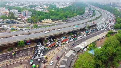 A photo taken by drones moves slowly in a traffic jam on the Delhi-Gurugram Expressway in Gurugram on Wednesday. (ANI)