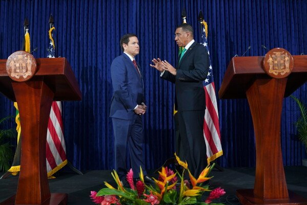 U.S. Secretary of State Marco Rubio (left) and Jamaican Prime Minister Andrew Holness speak after a joint news conference at the Prime Minister's Office in Kingston, Jamaica, March 26, 2025. (Nathan Howard/Pool Photo via AP, File)