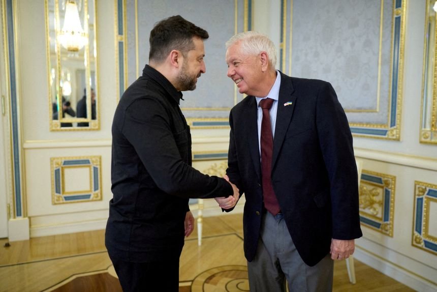 Ukrainian President Volodymyr Zelensky greets US Senator Lindsey Graham before their meeting in Kyiv on July 10.