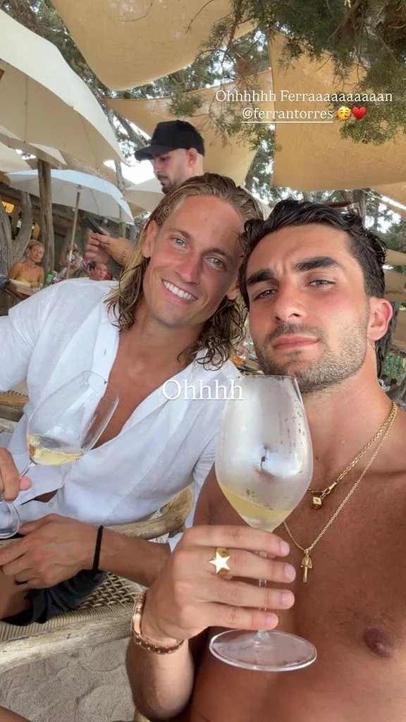 Ferran Torres and Marcos Llorente at an exclusive beach bar in Cala Hondal in Ibiza