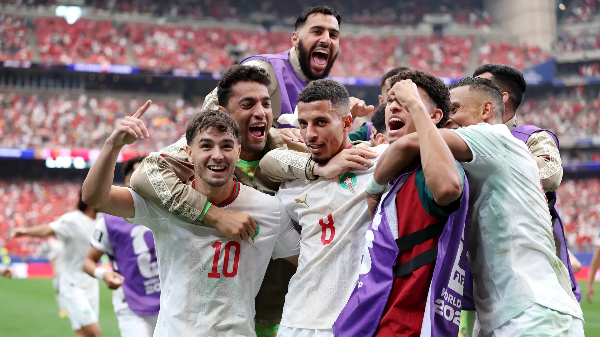 What is Morocco's current FIFA ranking ahead of the 2026 World Cup match against France? 12 Azzedine Unahi #8 of Morocco celebrates with teammates