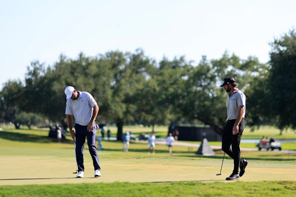 Scotty Scheffler and Cameron Young during the second round of the 2026 Cadillac Championship at Trump National Doral Miami | Source: Carmen Mandato/Getty Images.