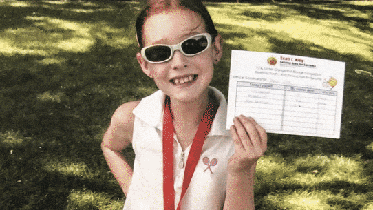 Maya Joynt, aged 7, celebrates beating Serena Williams at Wimbledon on Tuesday (AEST) after winning her first tournament.