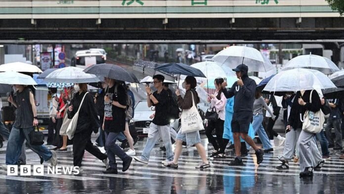 Typhoon Dujuan: Japan warns of flood and landslides as powerful typhoon approaches