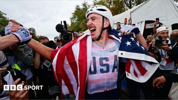 Brandon McNulty celebrating with the American flag after his win.